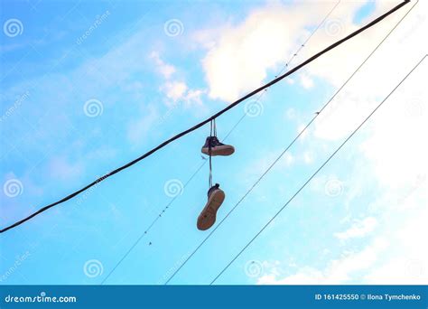 shoes on electric wires